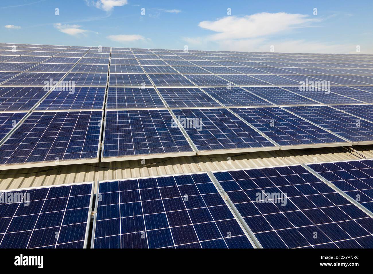 Solar photovoltaic panels installed on building roof for producing ...