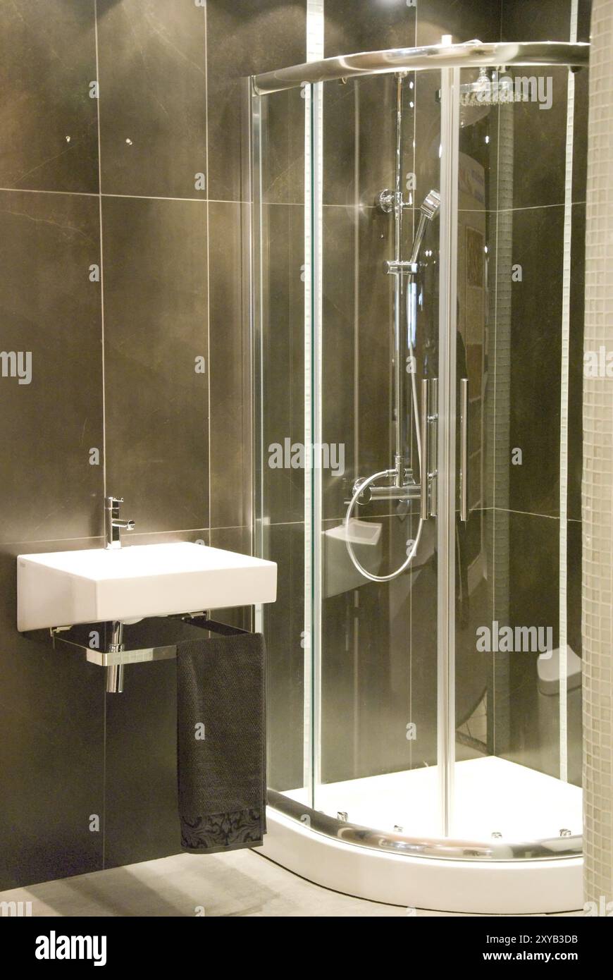 Modern black bathroom with shower Stock Photo - Alamy