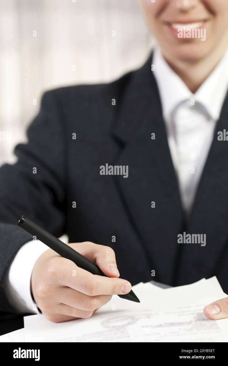 Business women hand pen writing paper document Stock Photo - Alamy