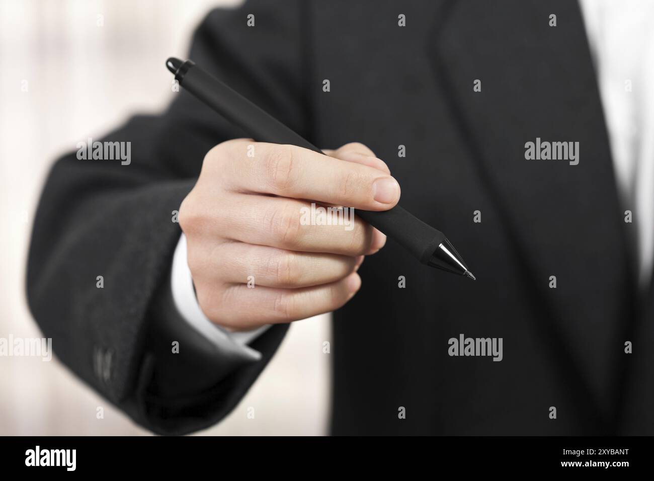 Mans hand with ballpoint pen hi-res stock photography and images - Alamy