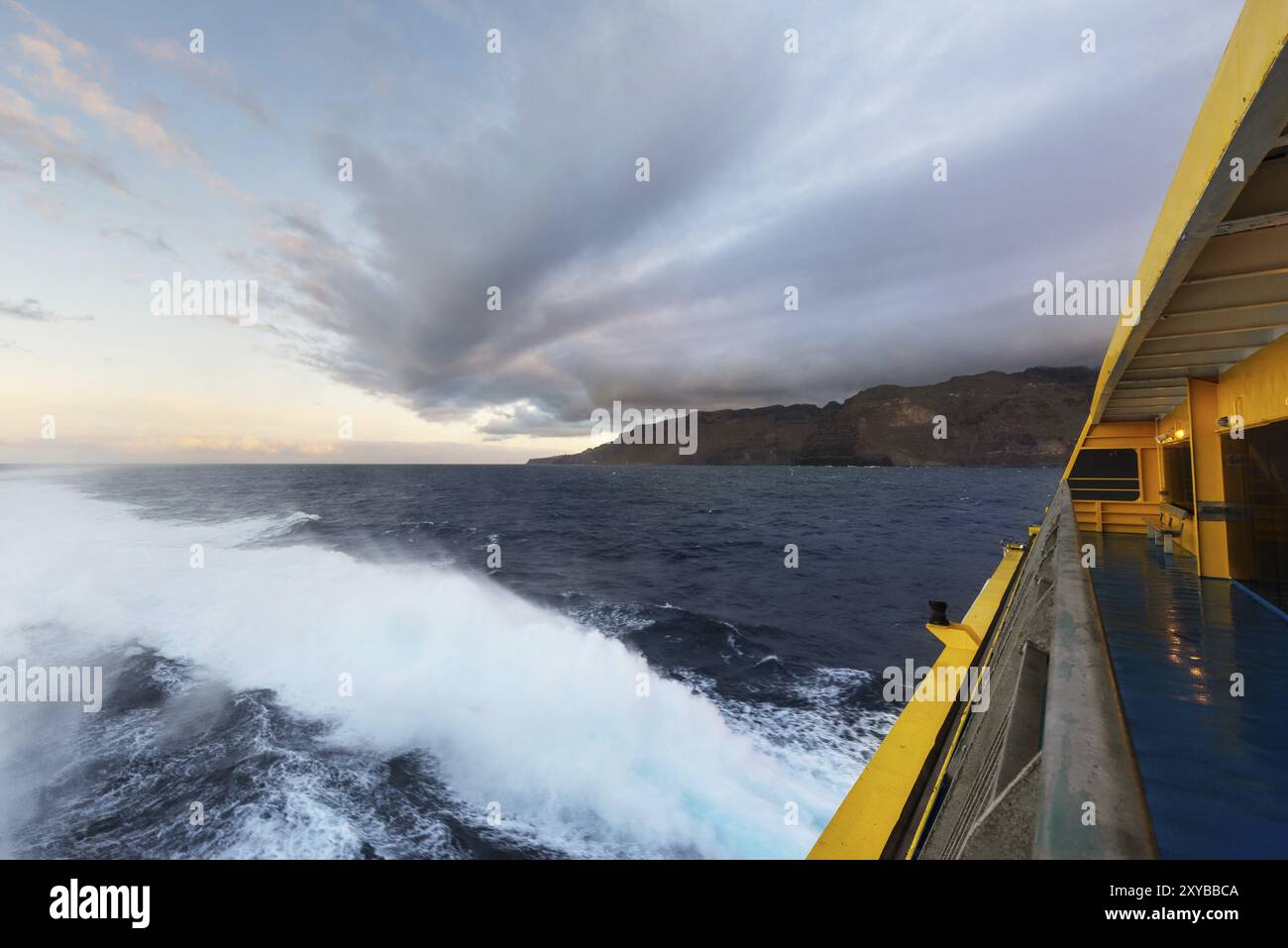 Clouds at dusk at sea from cruise ship railing Stock Photo - Alamy