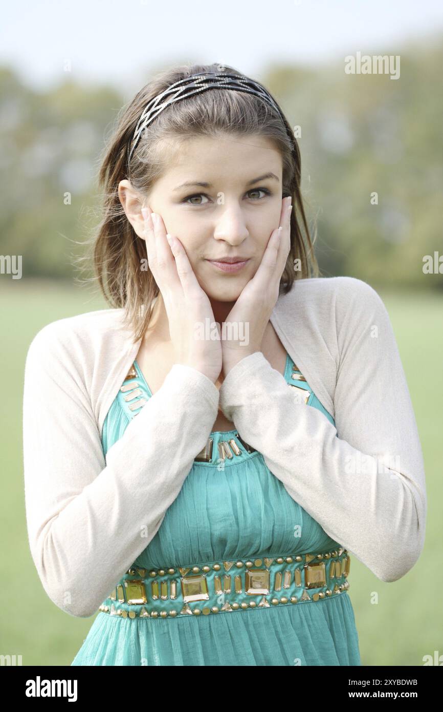 Portrait of the young girl on the autumn forest background Stock Photo ...