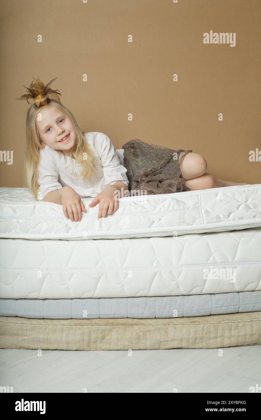 Pretty blonde lying on bed hi-res stock photography and images - Alamy