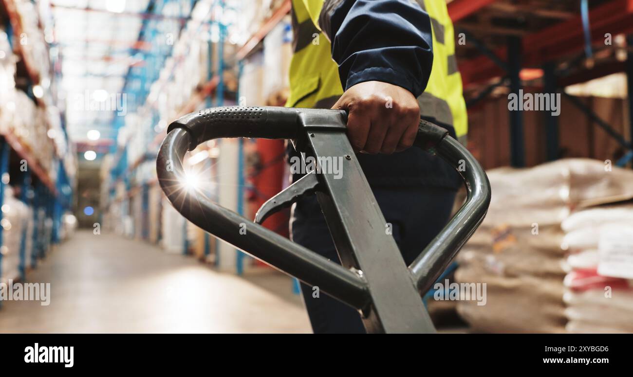 Warehouse worker hand pallet truck hi-res stock photography and images ...