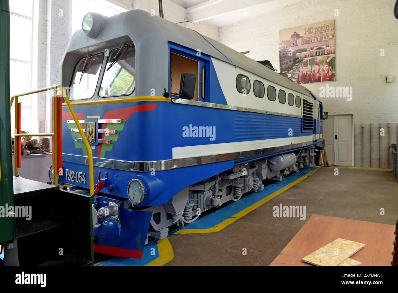 Diesel locomotive in the shed at the Children's Railway of Kharkiv, Ukraine, May 2024 Stock Photo