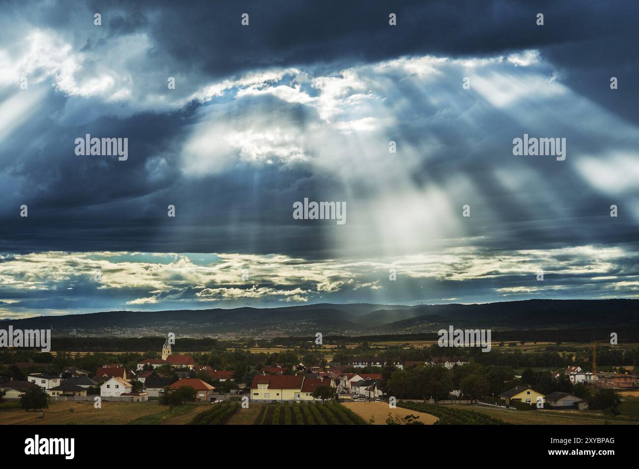 Storm clouds with rays of sunshine over Eisenstadt and Oslip Stock ...