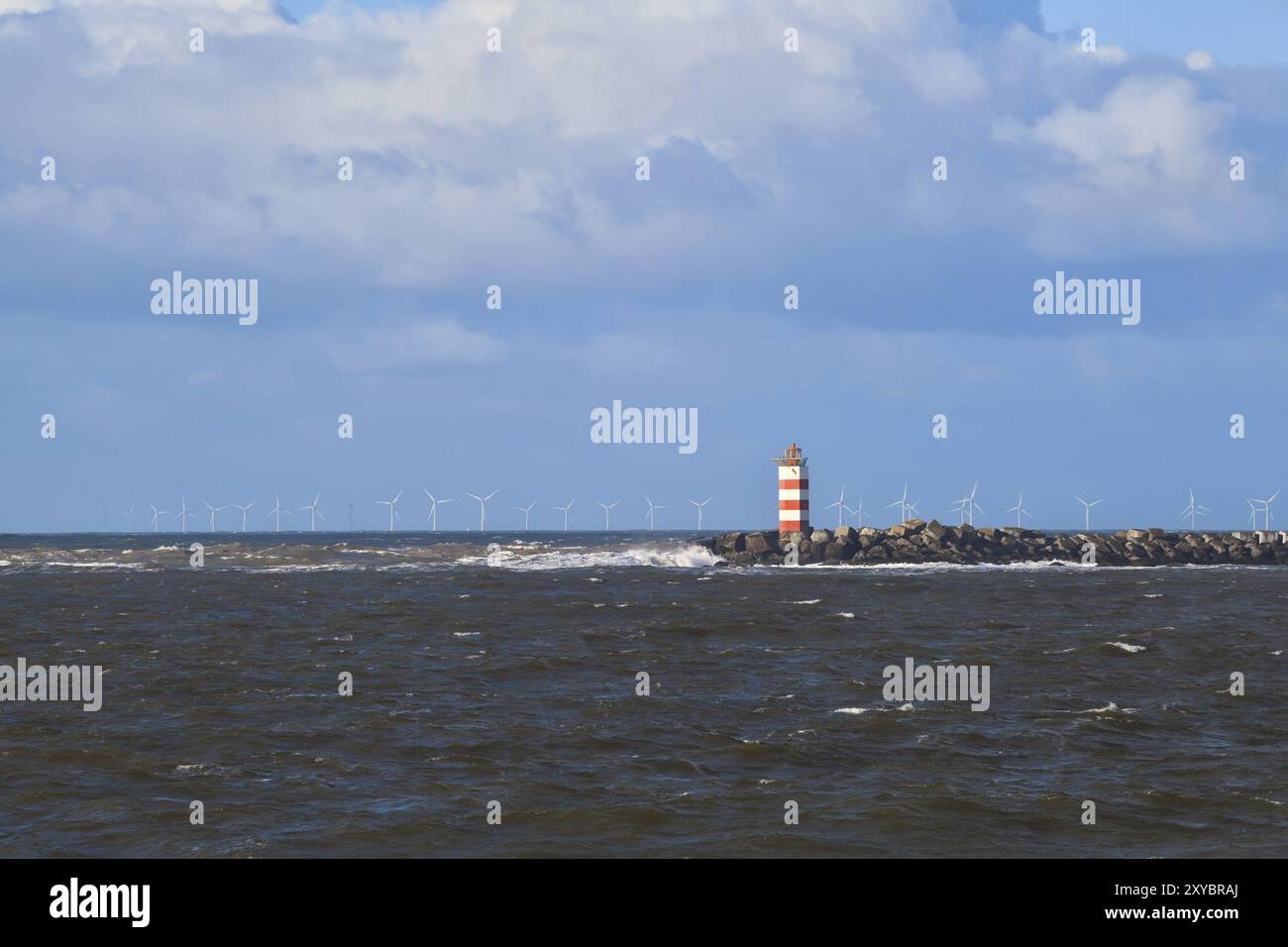 Red lighthouse in North sea, Netherlands Stock Photo