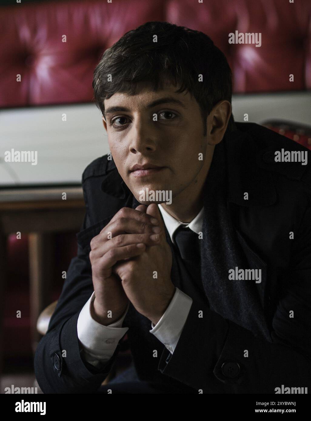 Portrait of a young man in a suit Stock Photo - Alamy