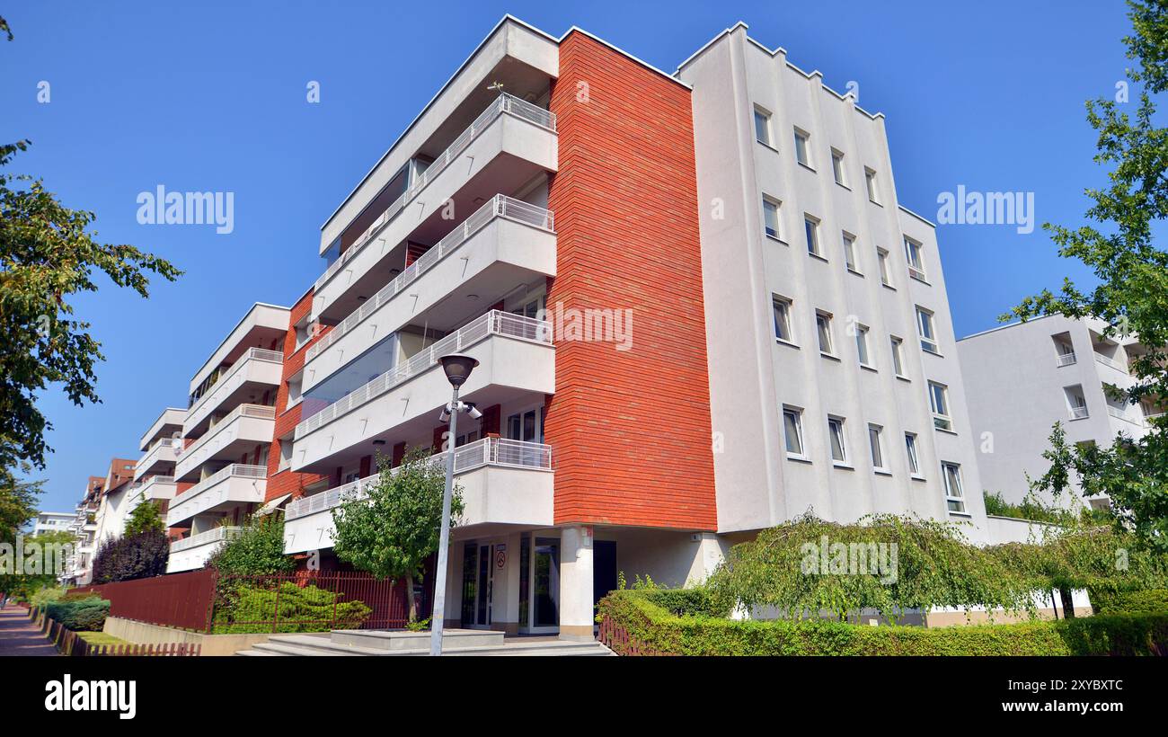 Photo inspiration: Green View Apartment With Natural Surroundings Reference: Low Angle View Apartment Building From The Beginning Of The