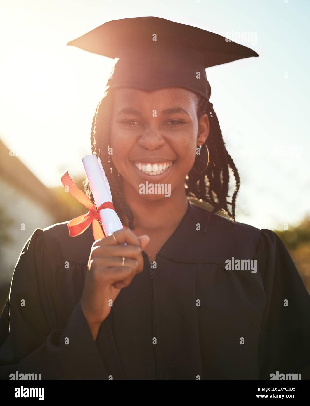 Portrait, graduate student and happy black woman with diploma outdoor ...