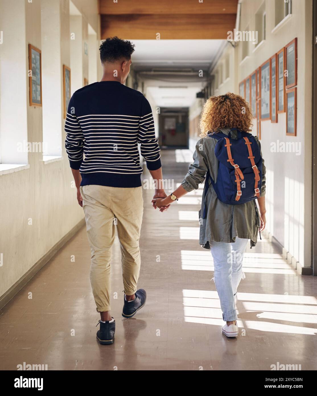 College students walking holding hands hi-res stock photography and ...