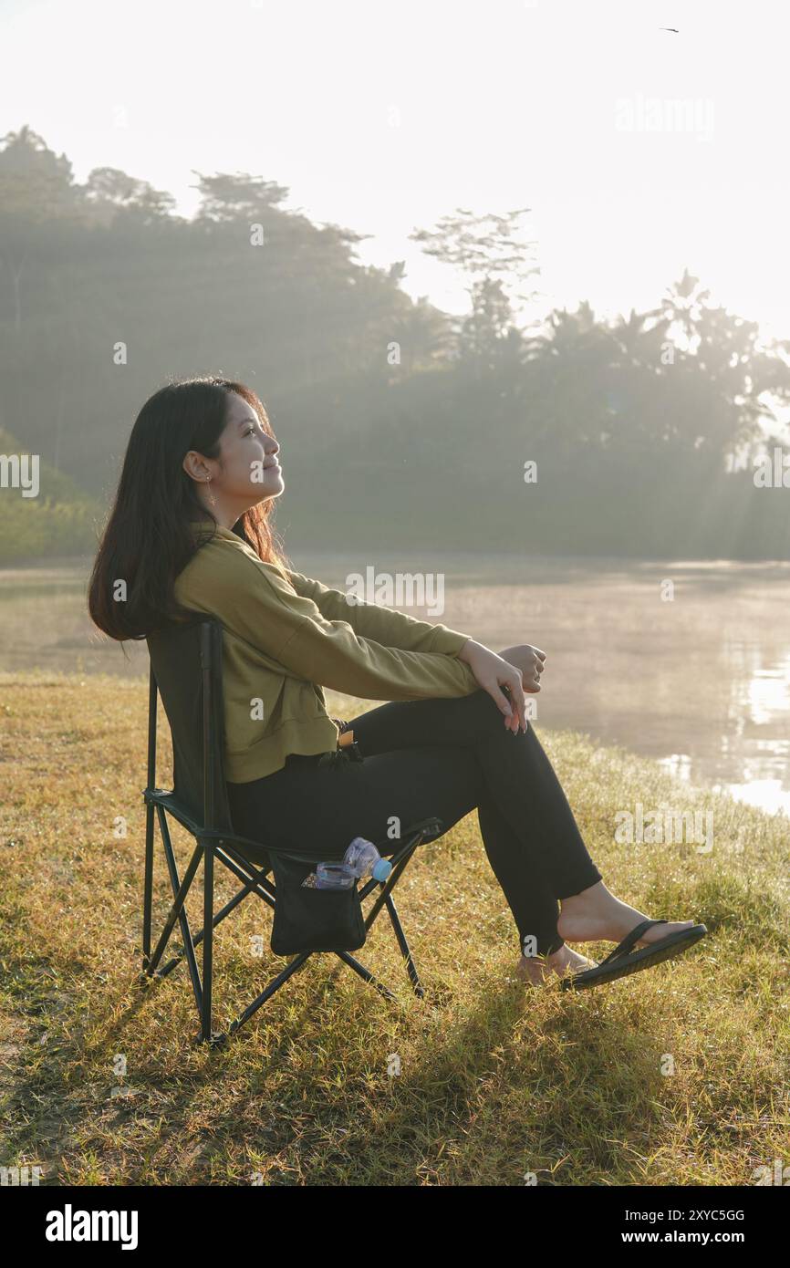 Happy lonely asian lady in hi-res stock photography and images - Alamy