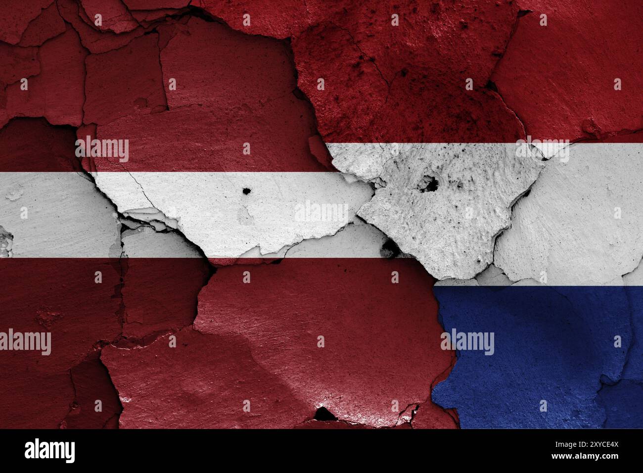 Flags of Latvia and Netherlands painted on cracked wall Stock Photo - Alamy