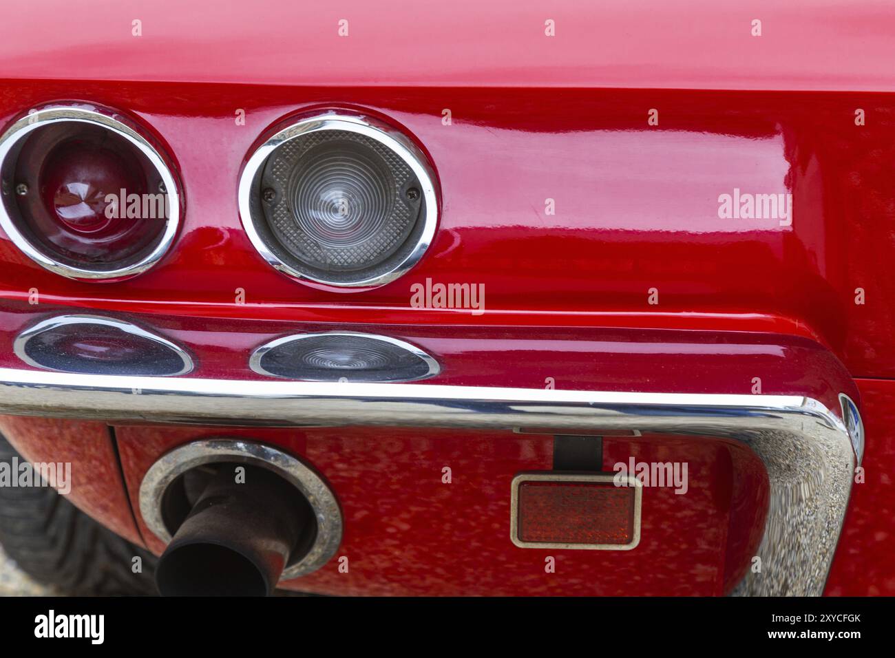 Rear view of an American sports car from the sixties Stock Photo - Alamy