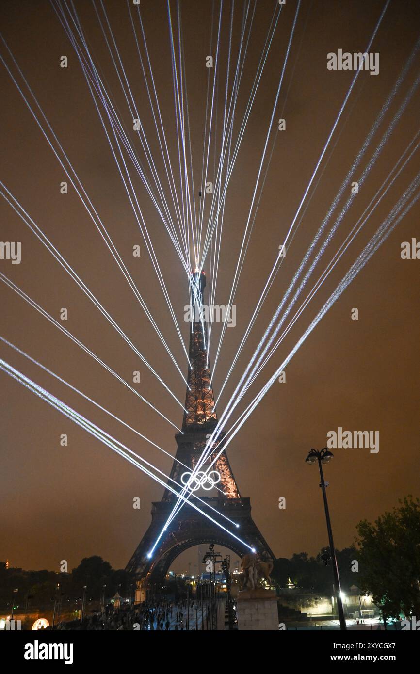 PARIS, FRANCE26 July 2024 Lights illuminate the Eiffel Tower during