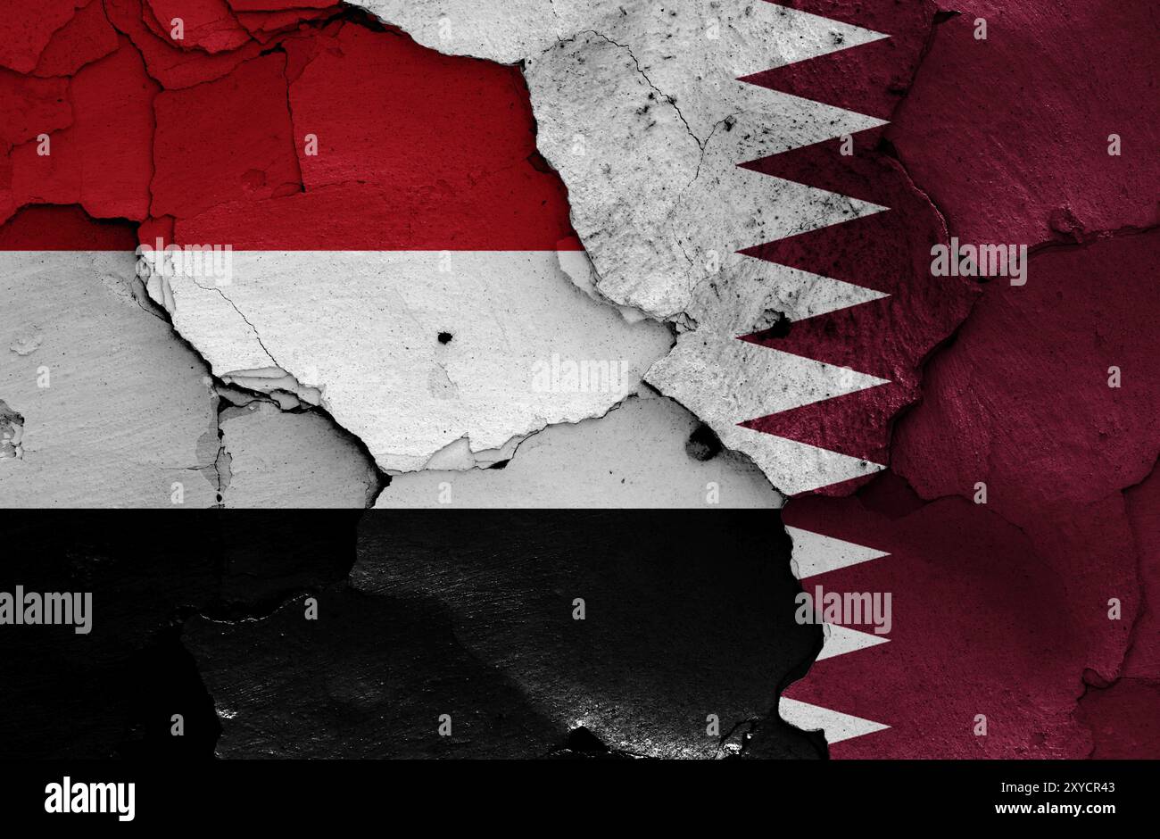 Flags of Yemen and Qatar painted on cracked wall Stock Photo - Alamy
