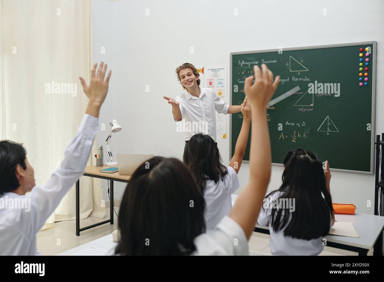 Teaching Mathematics Concept In Bright Classroom Setting Stock Photo
