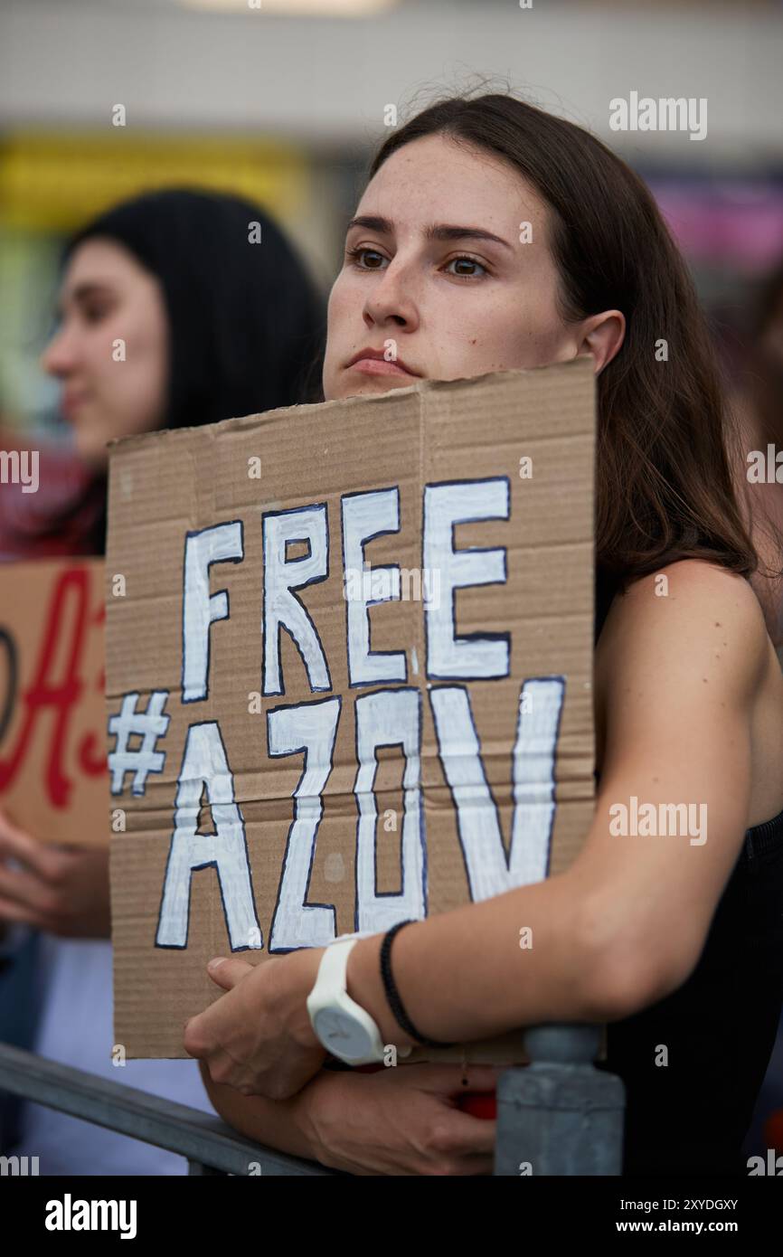 Sad Ukrainian woman demonstrating with a sign Free Azov in Kyiv - 18 ...