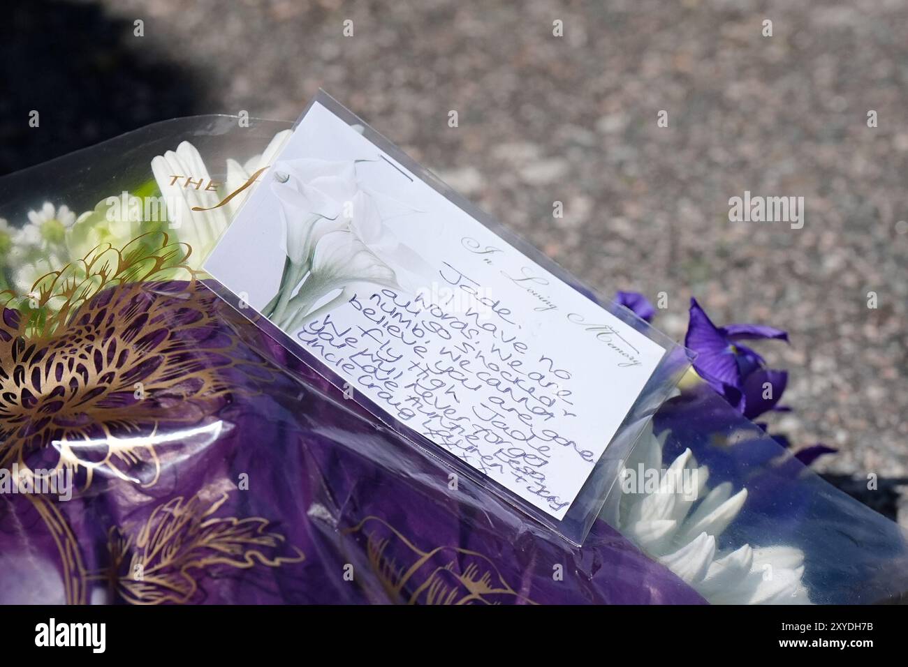 A message on a floral tribute on Overbury Street, near the scene in Rushmore Road, Clapton, east London, after a man in his 30s was stabbed to death. Two men have been arrested. Picture date: Thursday August 29, 2024. Stock Photo