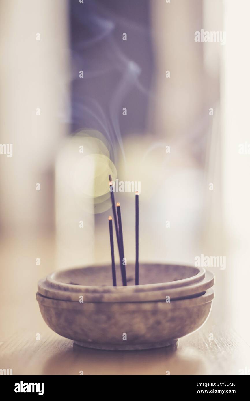 Lighted incense sticks hi-res stock photography and images - Alamy