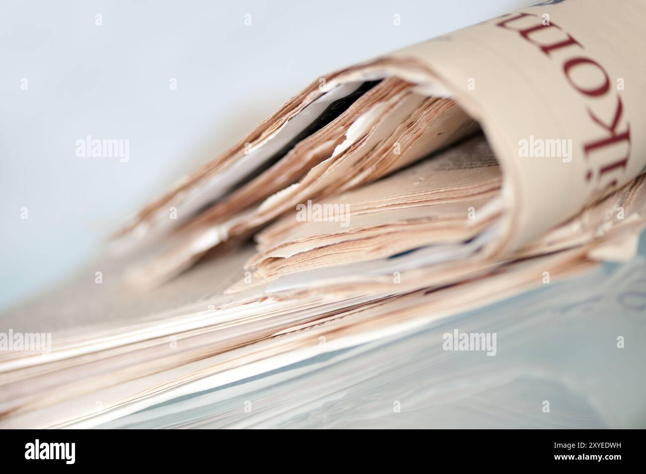 A pile of old yellowed daily newspapers Stock Photo