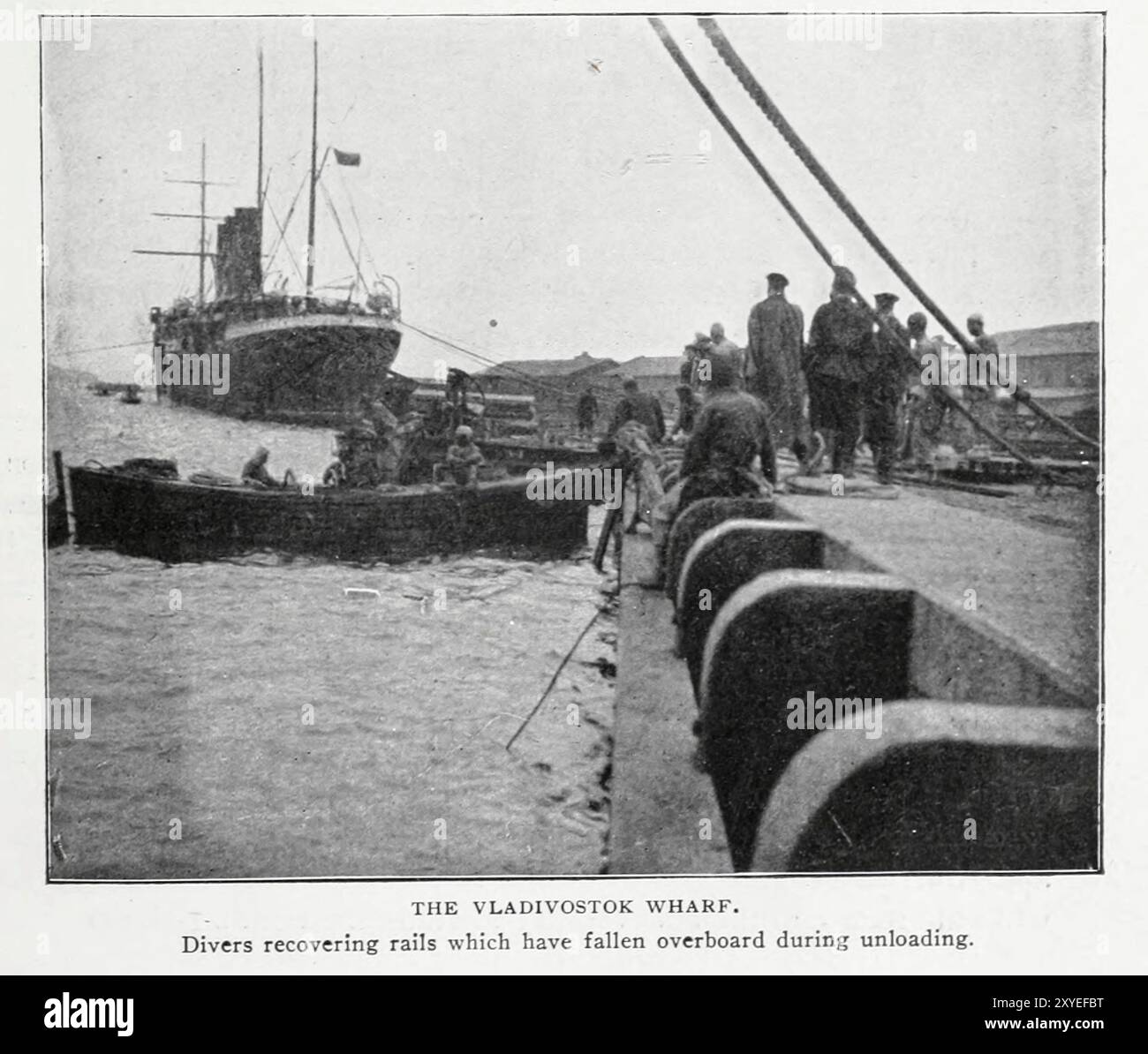Warlf Rails THE VLADIVOSTOK WHARF. Divers recovering rails which have fallen ...