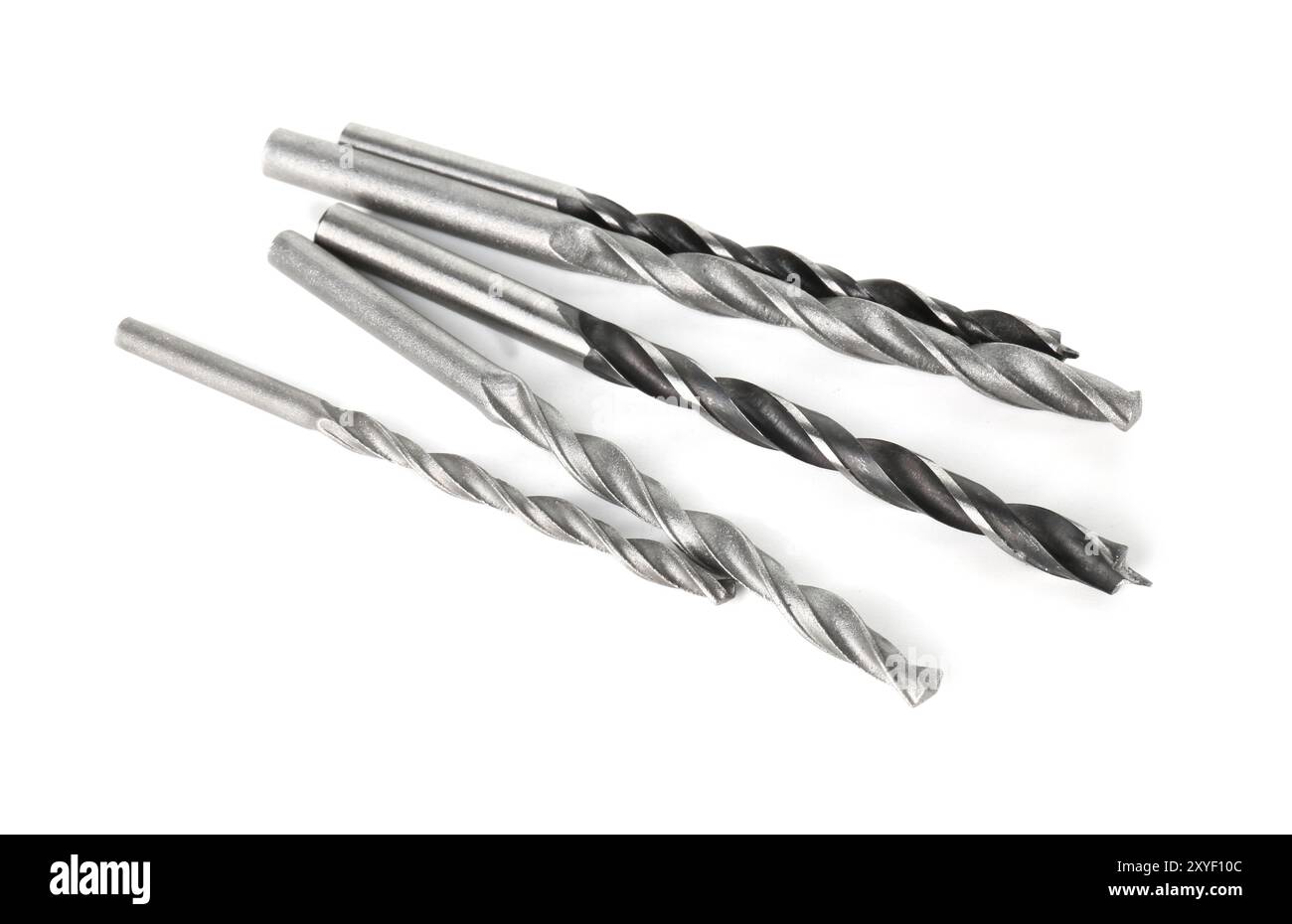 Many different drill bits isolated on white Stock Photo
