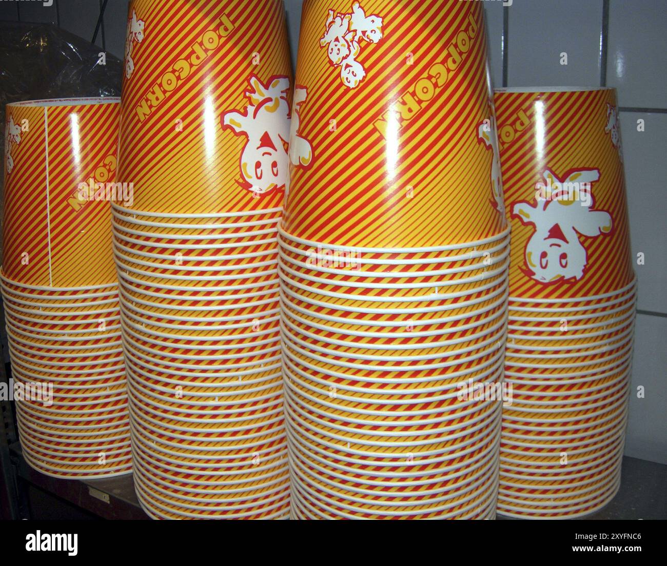 Stack of cups in a cinema Stock Photo - Alamy
