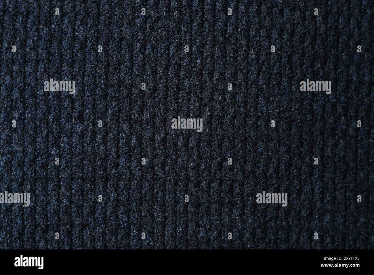 Texture of dark blue knitted fabric as background, top view Stock Photo ...
