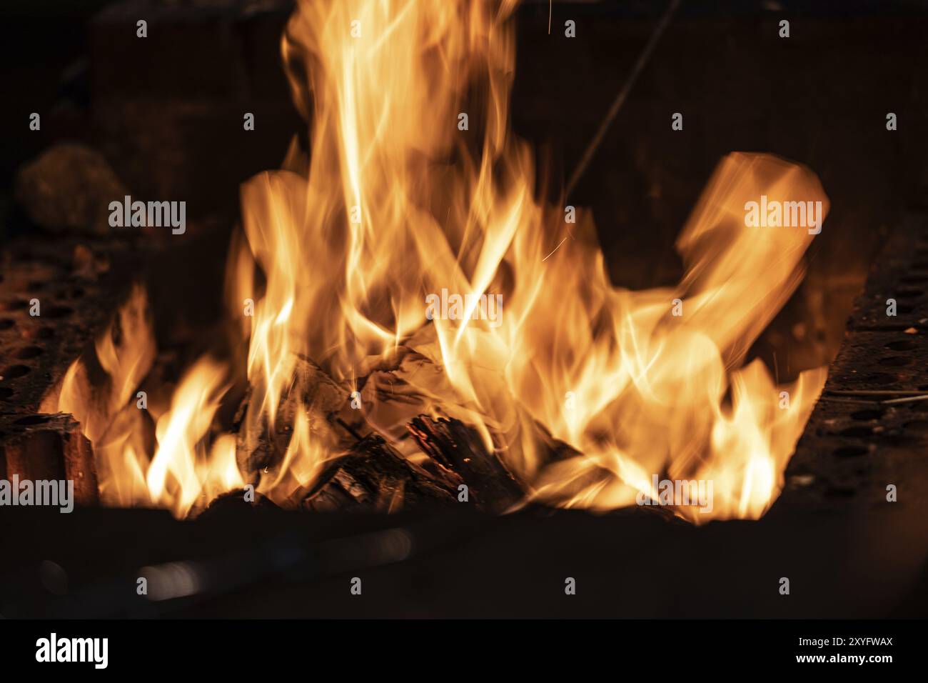 Long exposure image of a campfire burning at night Stock Photo - Alamy