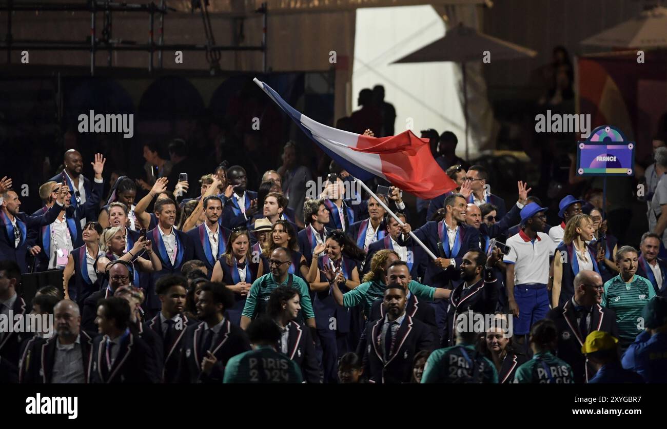 French Flag Bearer Alexis Hanquinquant During The Opening Ceremony Of french-flag-bearer-alexis-hanquinquant-during-the-opening-ceremony-of