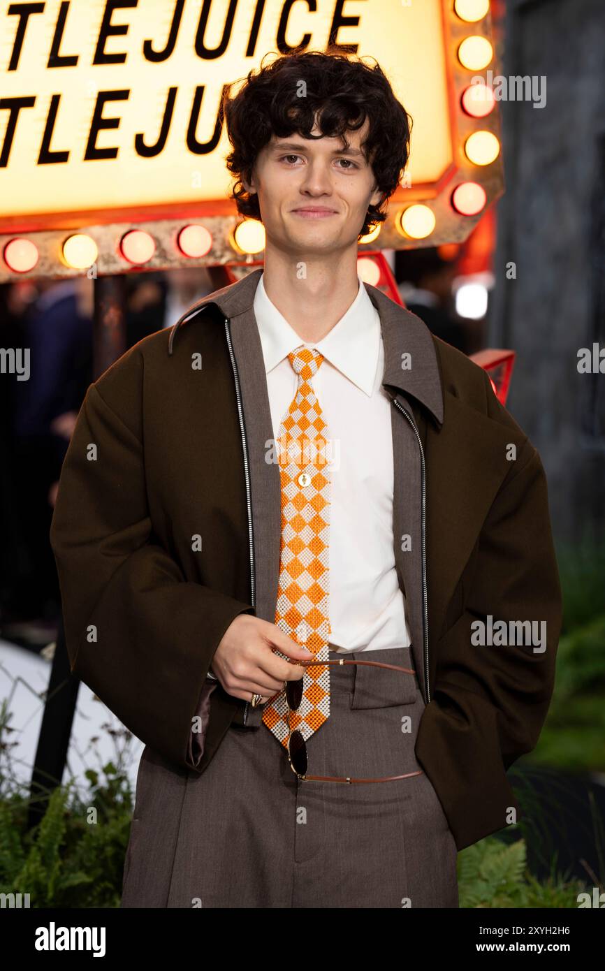 Arthur Conti poses for photographers upon arrival at the UK premiere of