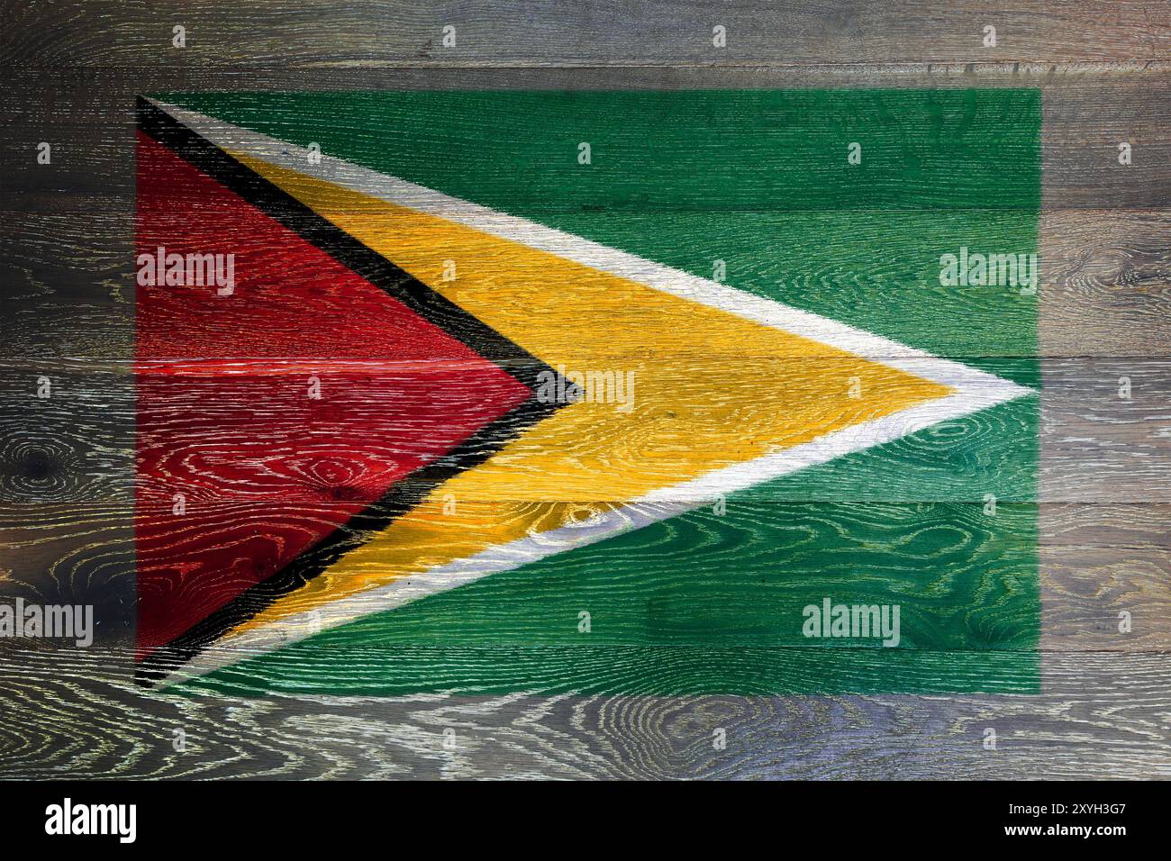 Guyana flag on rustic old wood surface background Stock Photo - Alamy