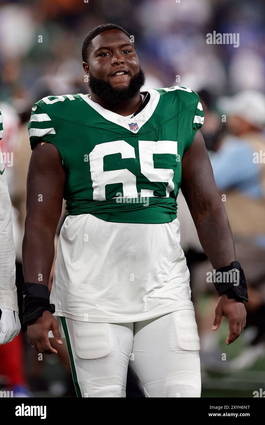 New York Jets guard Xavier Newman (65) walks off the field after a