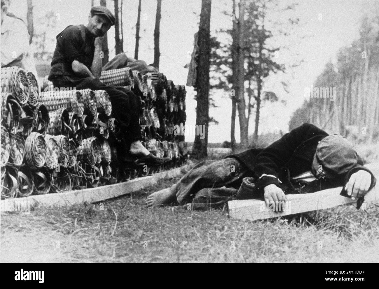 Hitler Loading Jewish men taking a break from their work. They are being forced to ...