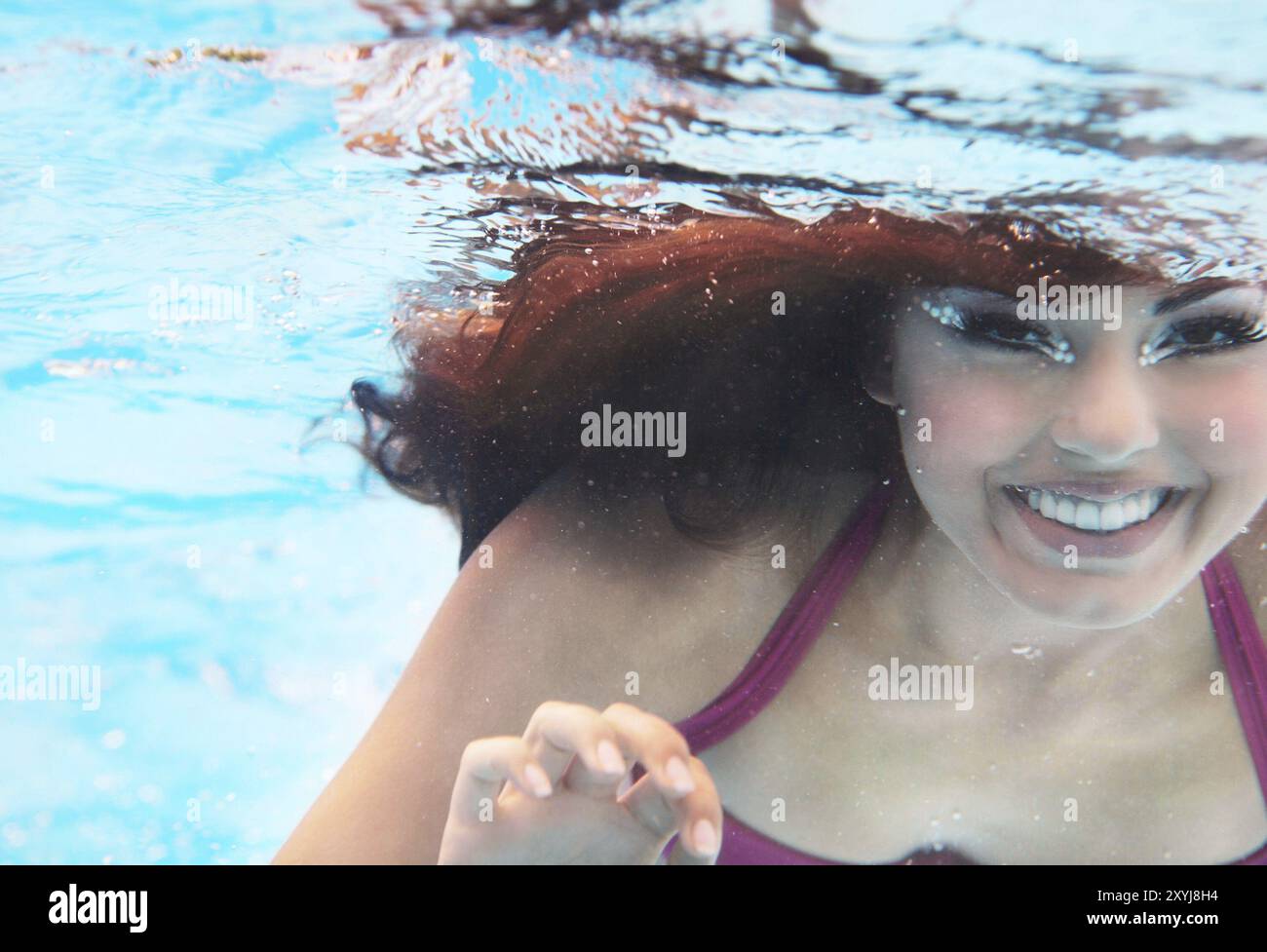 Underwater woman close up portrait in swimming pool Stock Photo - Alamy
