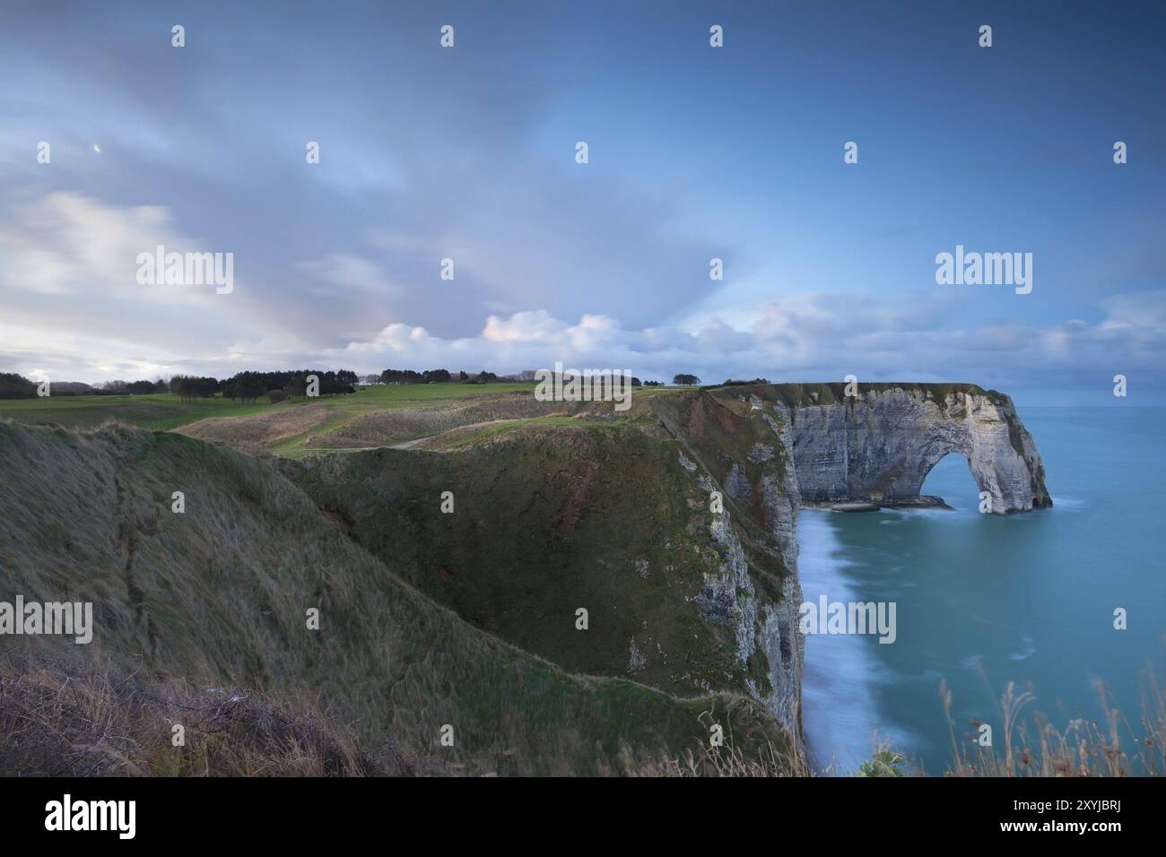 Cliffs and Atlantic ocean in dusk, Etretat, France, Europe Stock Photo ...