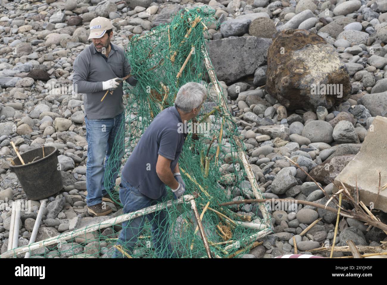 Clean Del Sol Local volunteer people cleaning the beach after a storm in Ponta do Sol ...