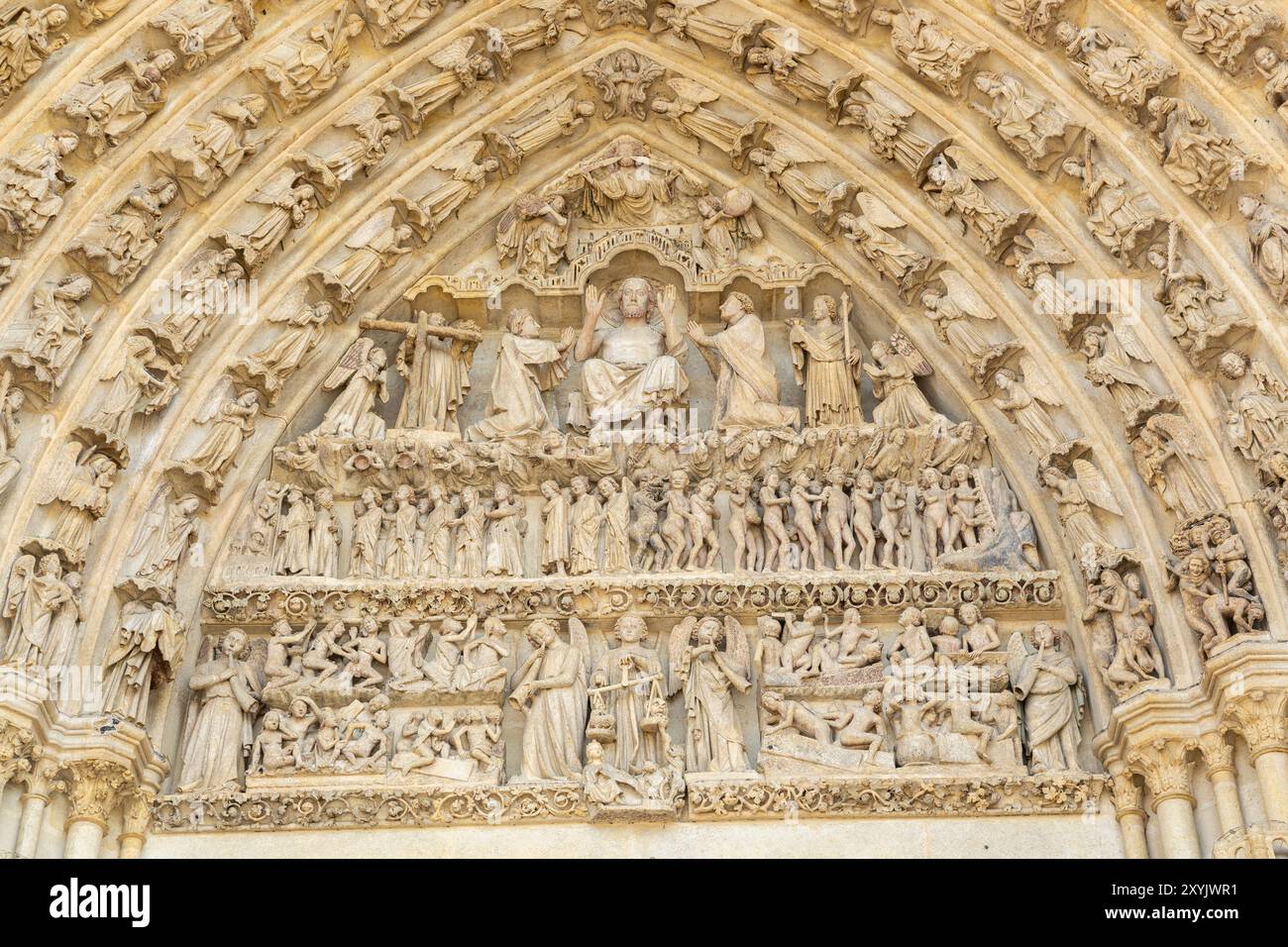 Tympanum of the central west portal showing Gothic sculptures of Christ ...