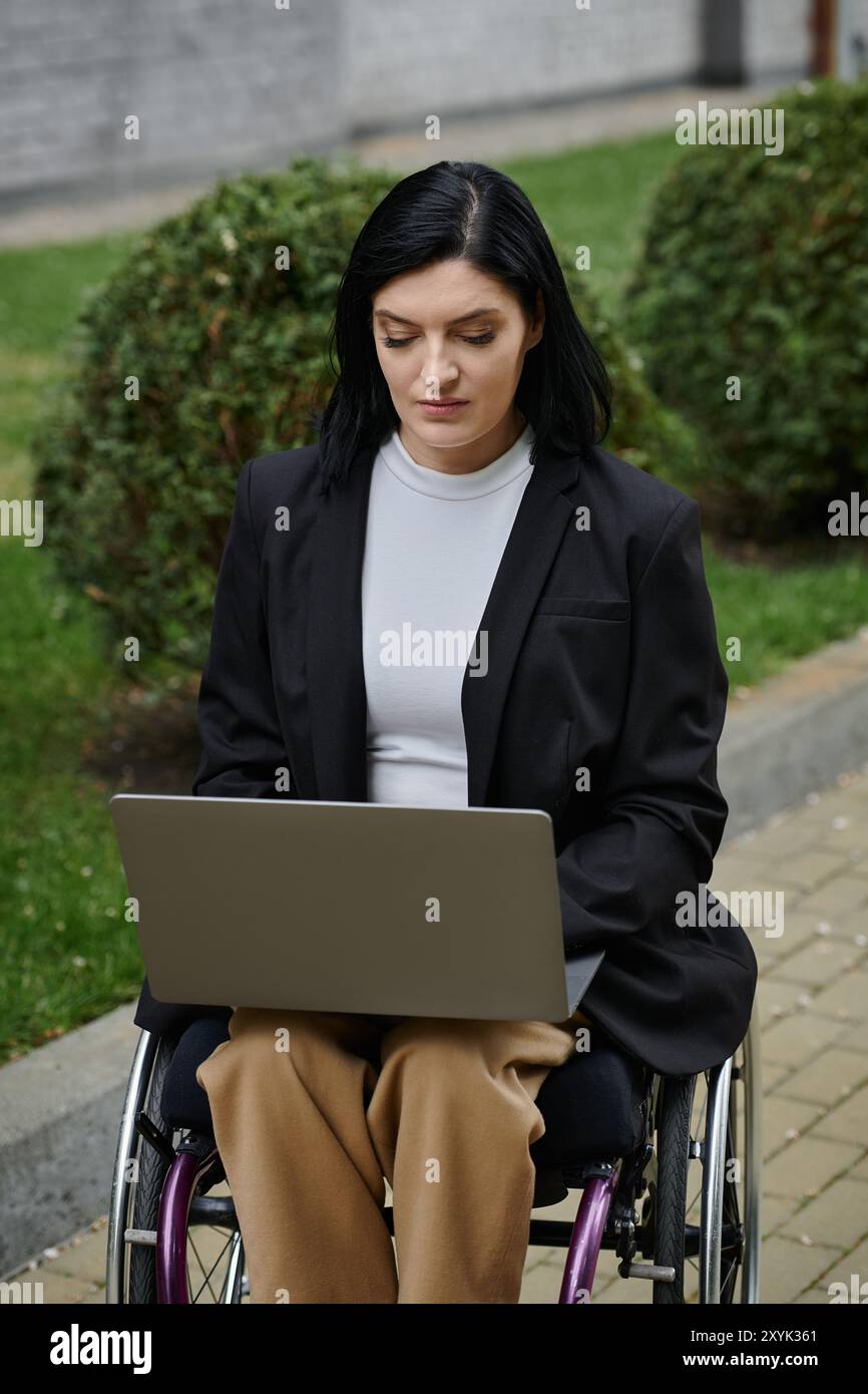 Black woman in wheelchair using hi-res stock photography and images - Alamy