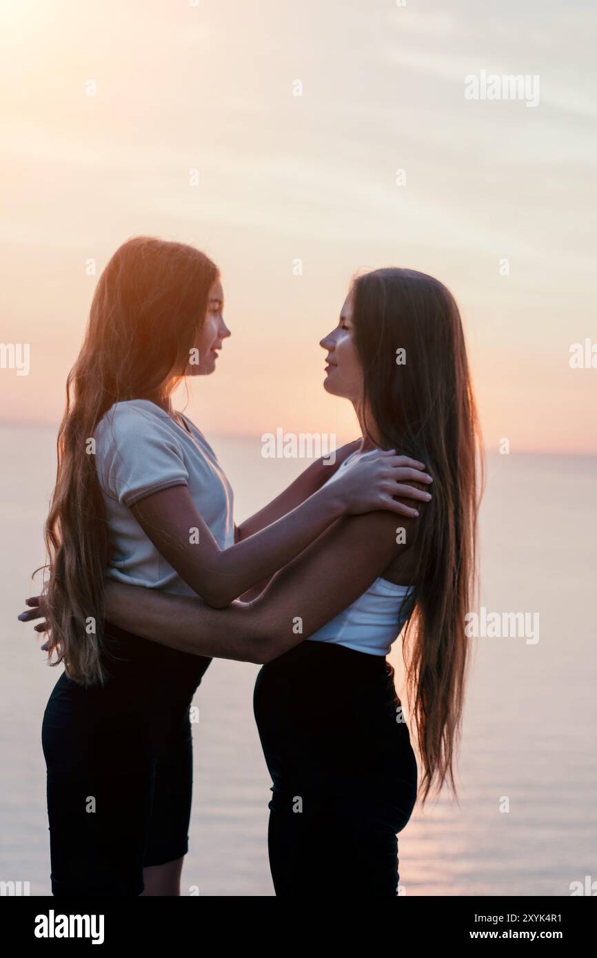 Two women in silhouette hi-res stock photography and images - Alamy