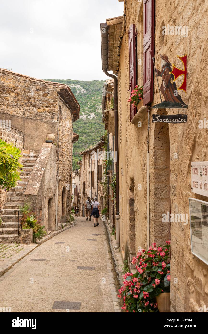 Narrow alleyway between old building, St Guilhem le Desert, Herault, Occitanie, France, Europe Stock Photo