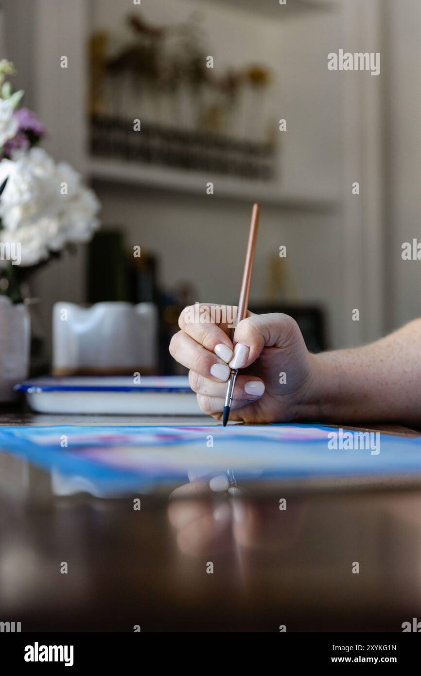 Artist holding paint brush hi-res stock photography and images - Alamy