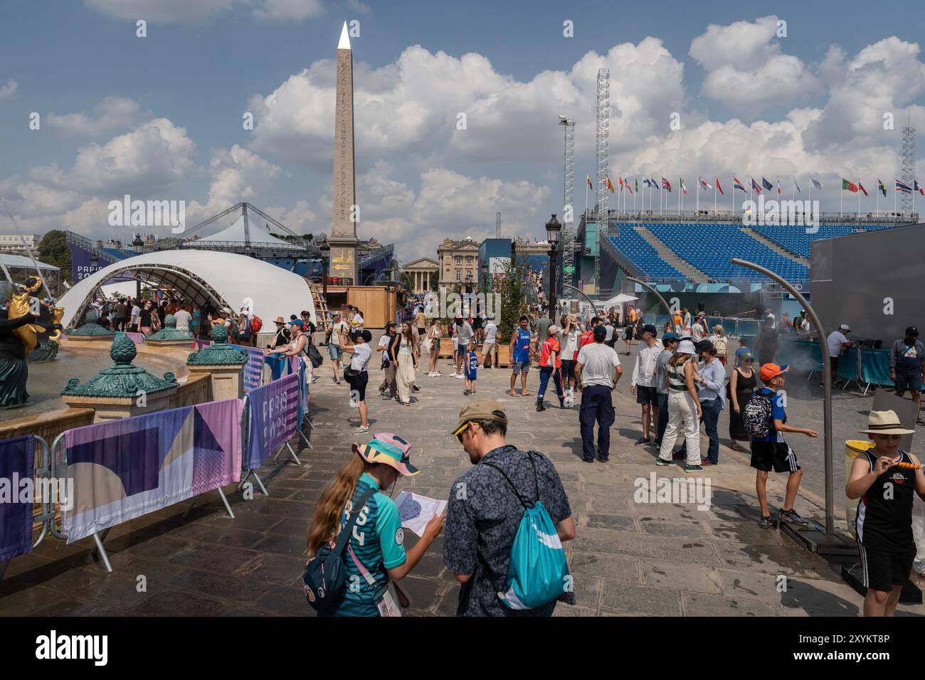 Specators head into Place de la Concorde during the 2024 Olympic Games, on Friday, August 2, 2024, in Paris, France. Stock Photo