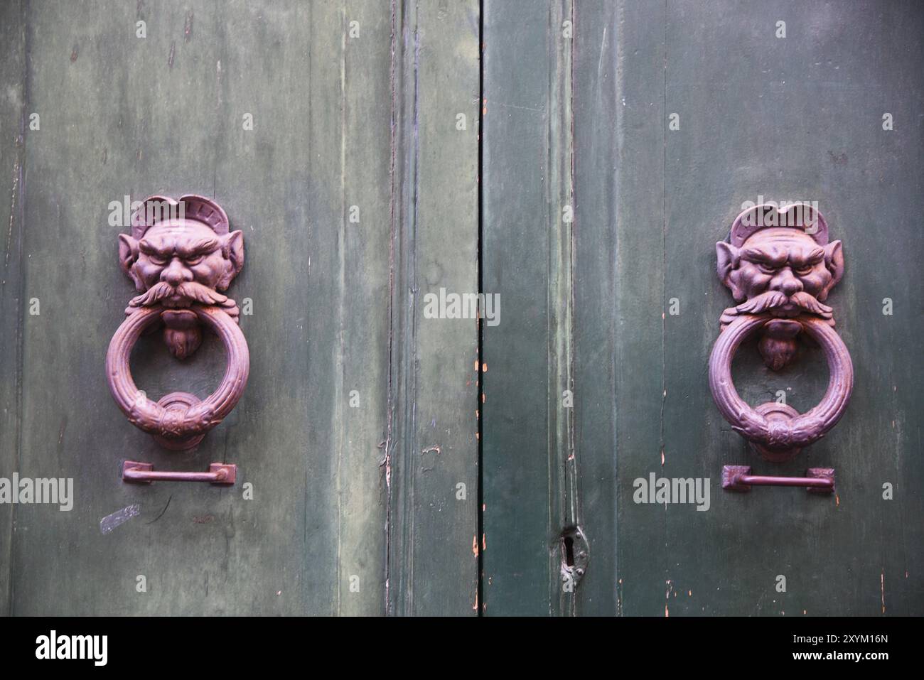 Pisa, Italy. Close ups of old door handles on italian doors Stock Photo