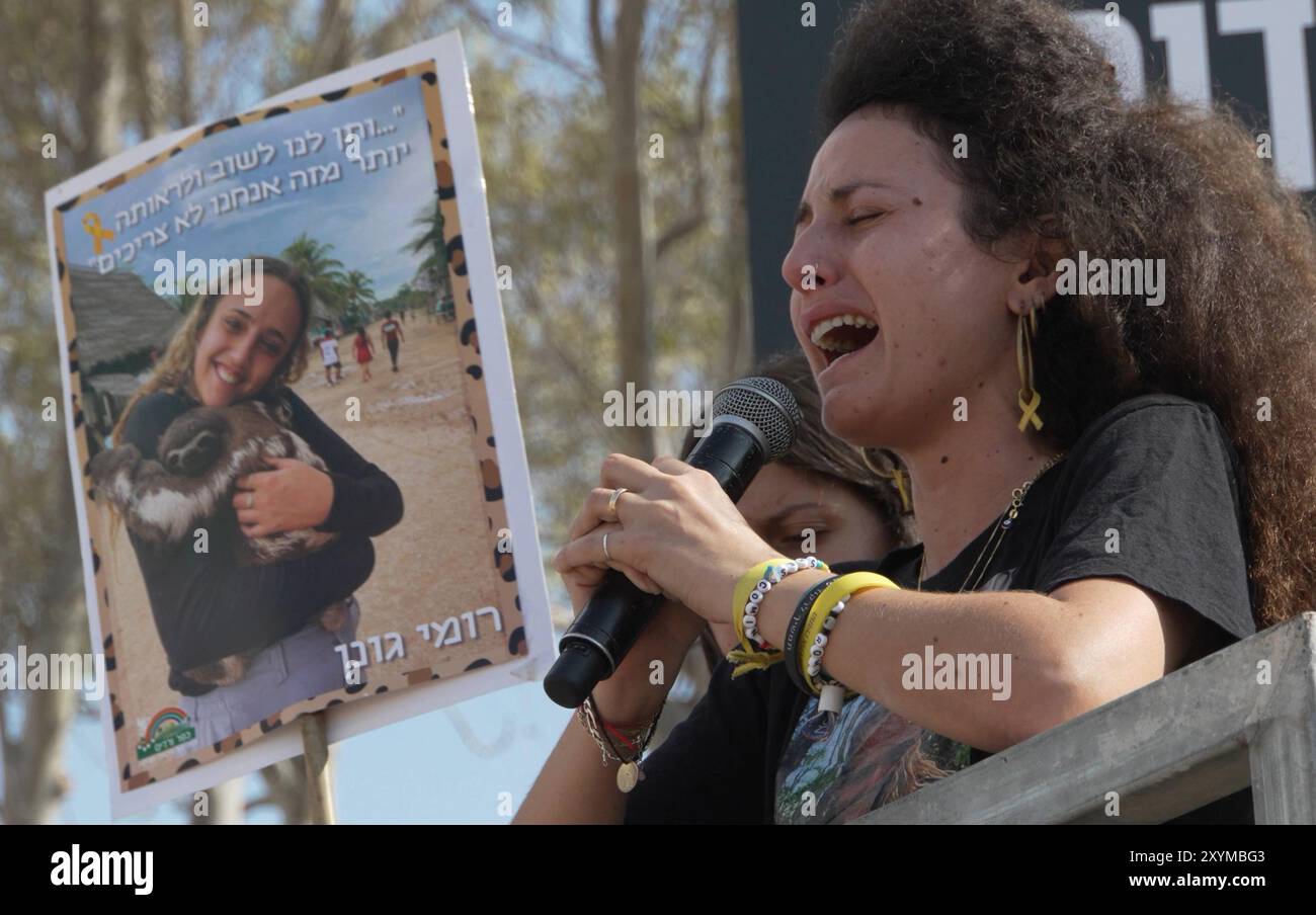 NIRIM, ISRAEL - AUGUST 29: The sister of Romi Gonen, 23, who is being held  captivity in Gaza after being abducted by Hamas on October 7, uses giant  speakers to call out