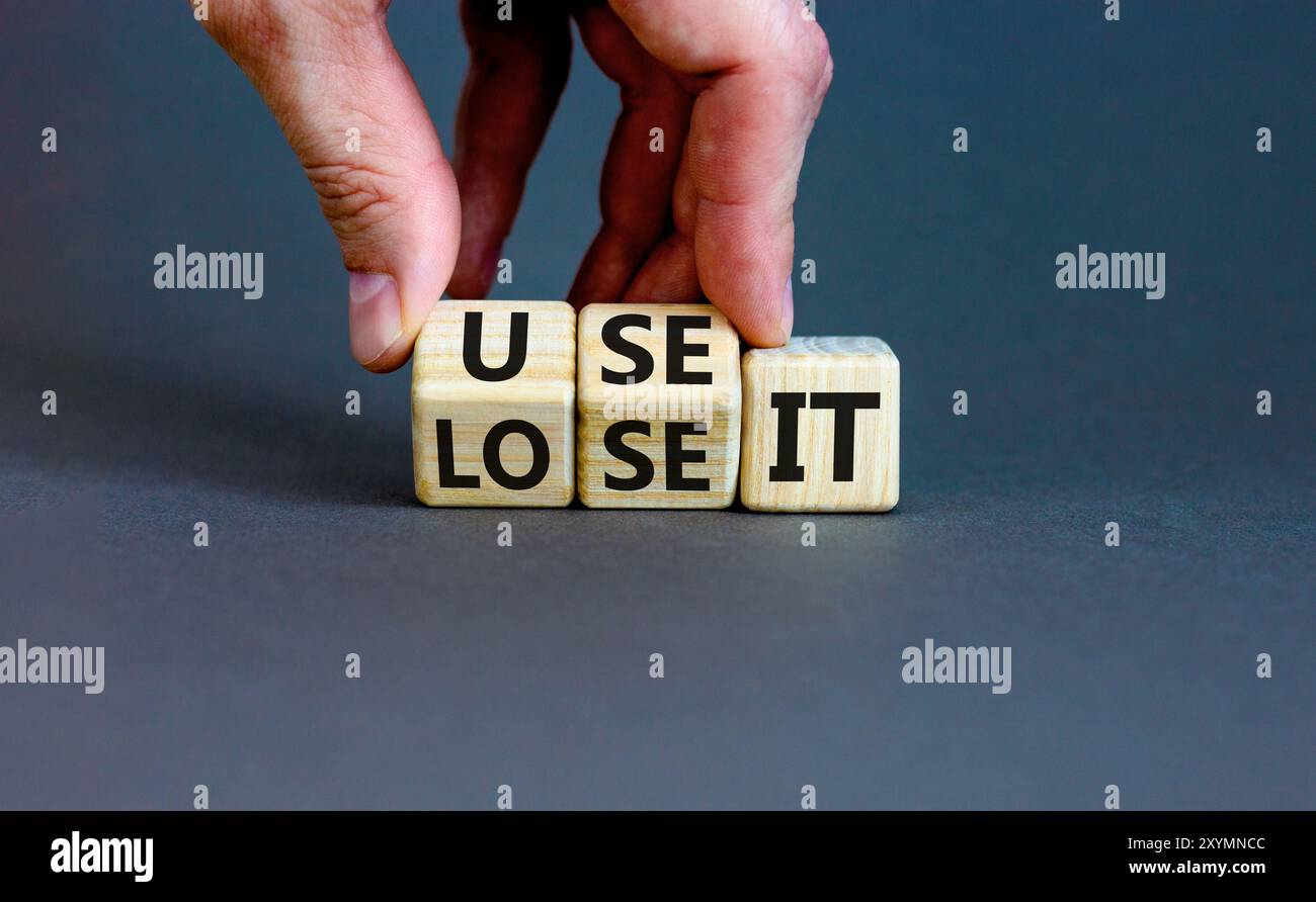 You use or lose it symbol. Concept word Use It or lose it on wooden ...