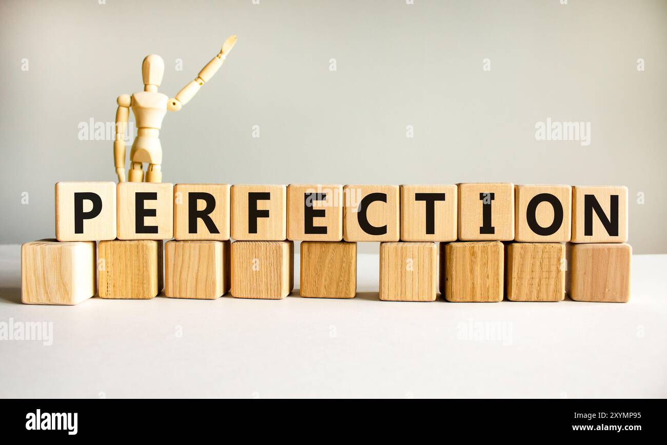 Perfection symbol. Concept word Perfection on beautiful wooden blocks ...