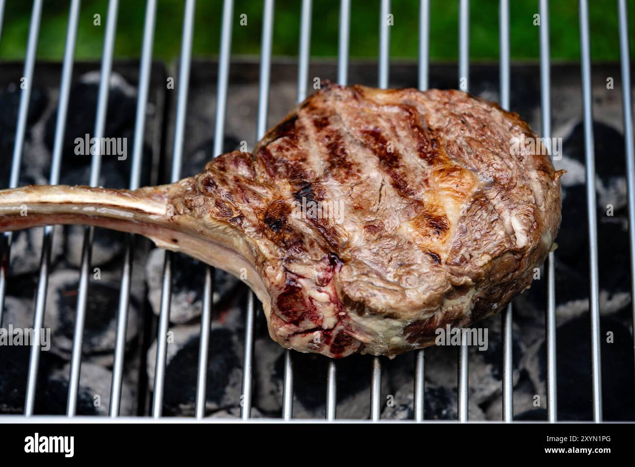 tomahawk steak on the grill Stock Photo