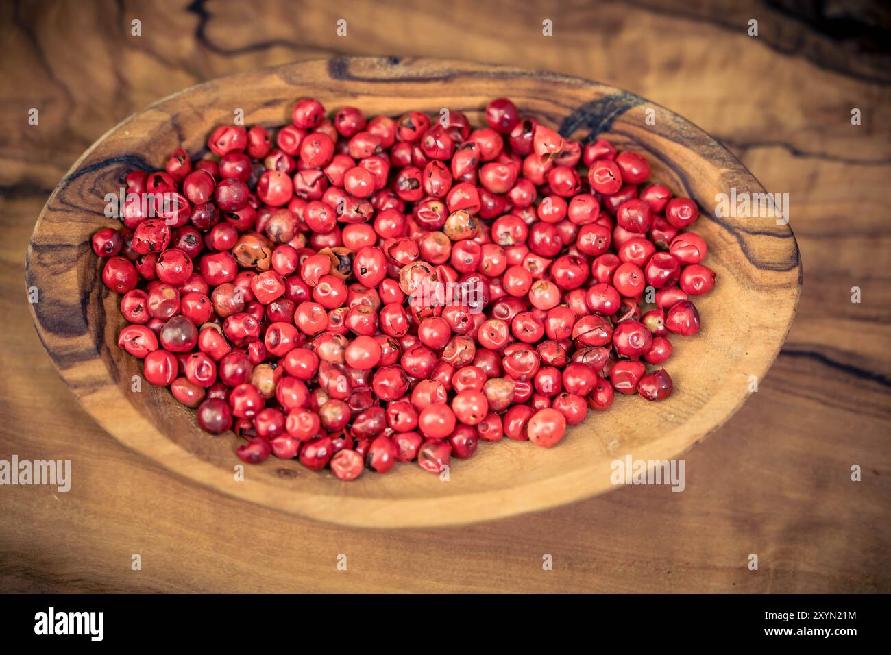Brazilian pepper tree, aroeira, rose pepper, broadleaved pepper tree, wilelaiki, wililaiki, Christmasberry (Schinus terebinthifolius), red pepper on a Stock Photo
